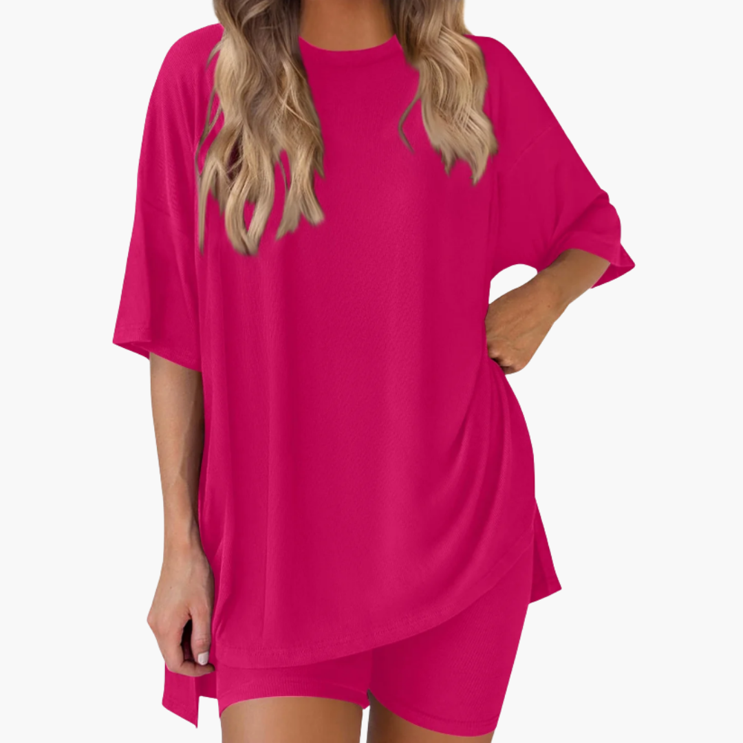 Completo sportivo donna con top a collo a V e pantaloncini larghi