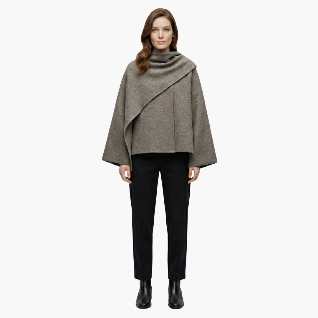 Manteau cape donna elegante con silhouette fluida e collo sciarpa