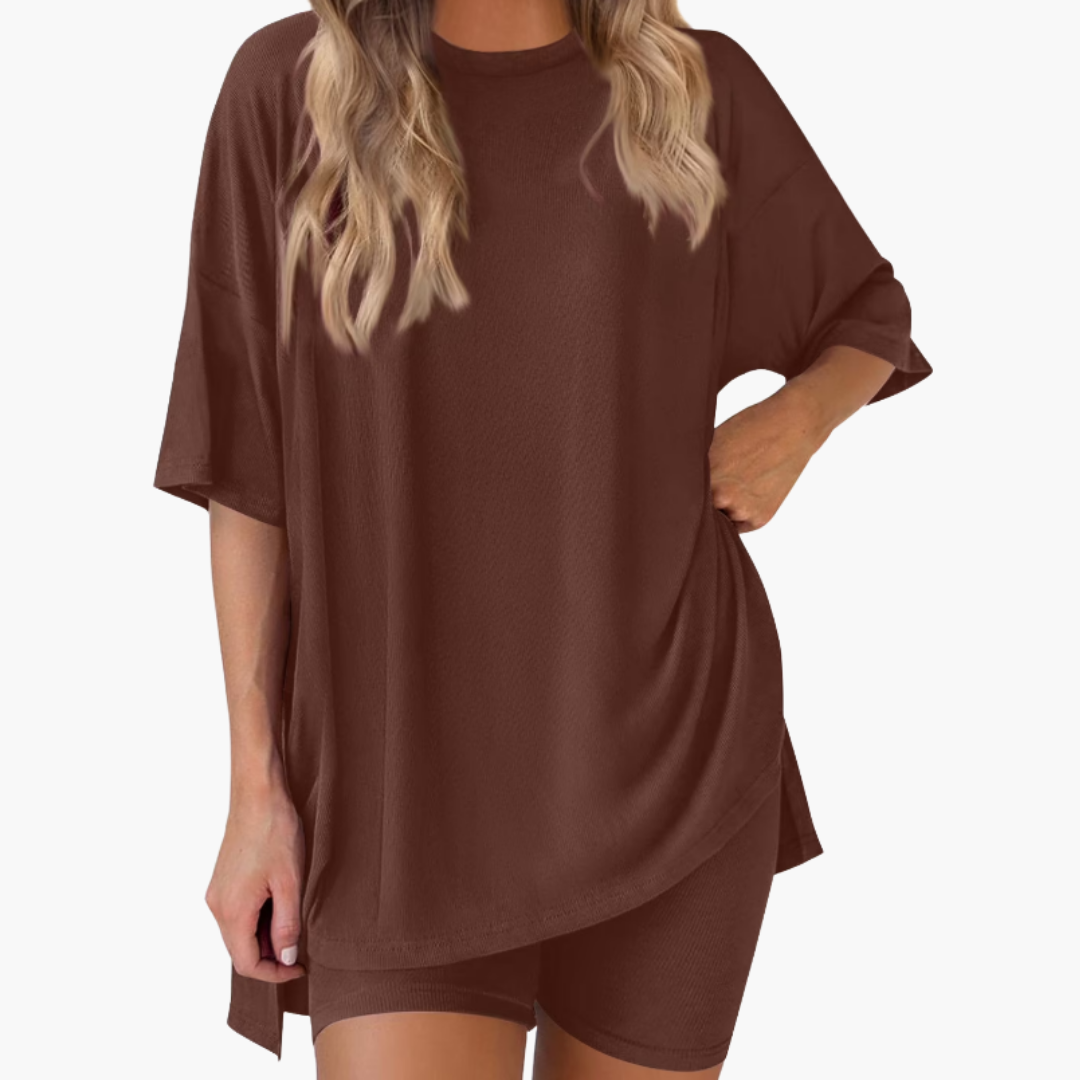 Completo sportivo donna con top a collo a V e pantaloncini larghi