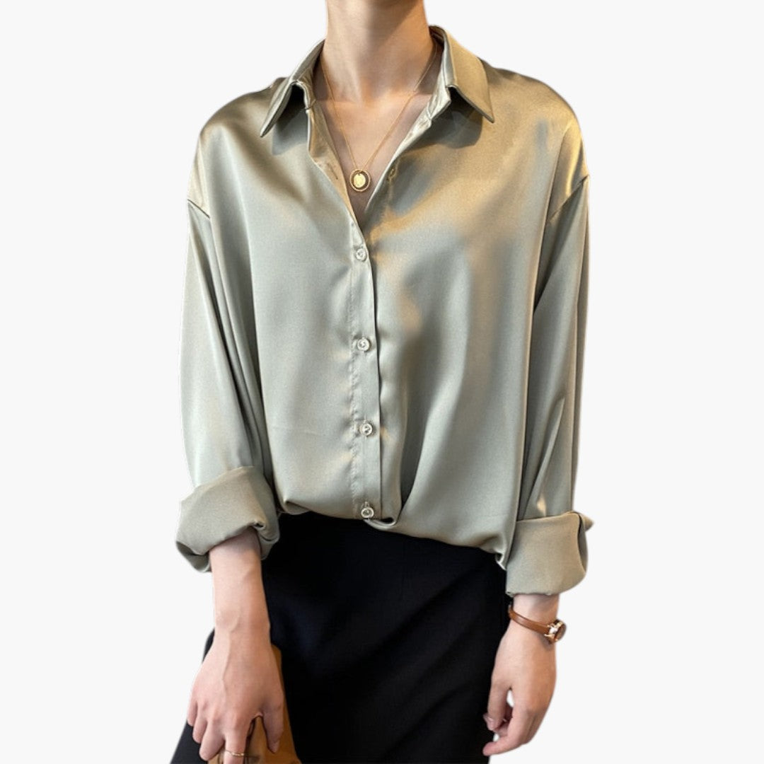 Women's blouse with collar and button closure