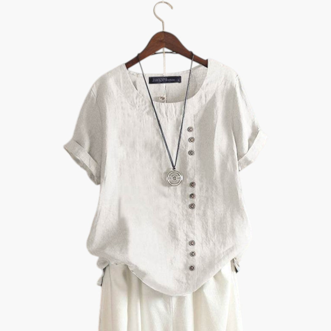 Women's blouse with round neckline and button detail