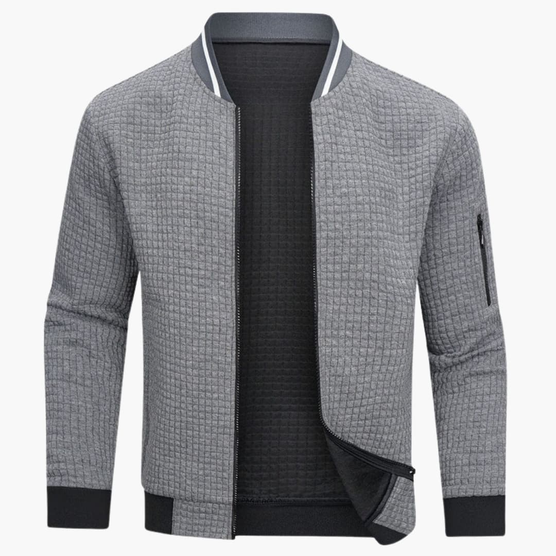 Blouson bomber matelassé pour homme avec ourlet côtelé et poche zippée sur la manche