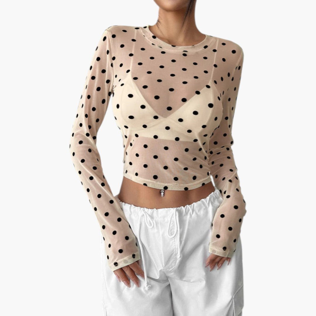 Women's blouse with round neckline and polka dot pattern