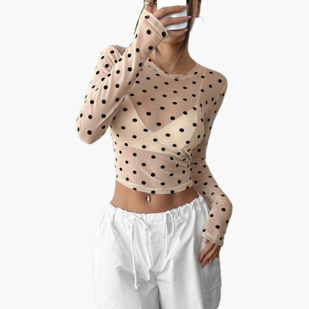 Women's blouse with round neckline and polka dot pattern