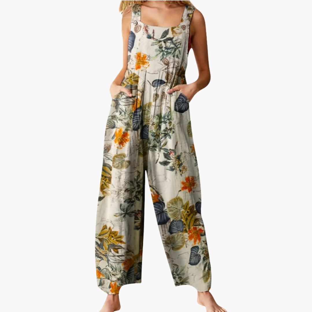 Kvinneheldrakt med justerbare skulderstropper og vide ben