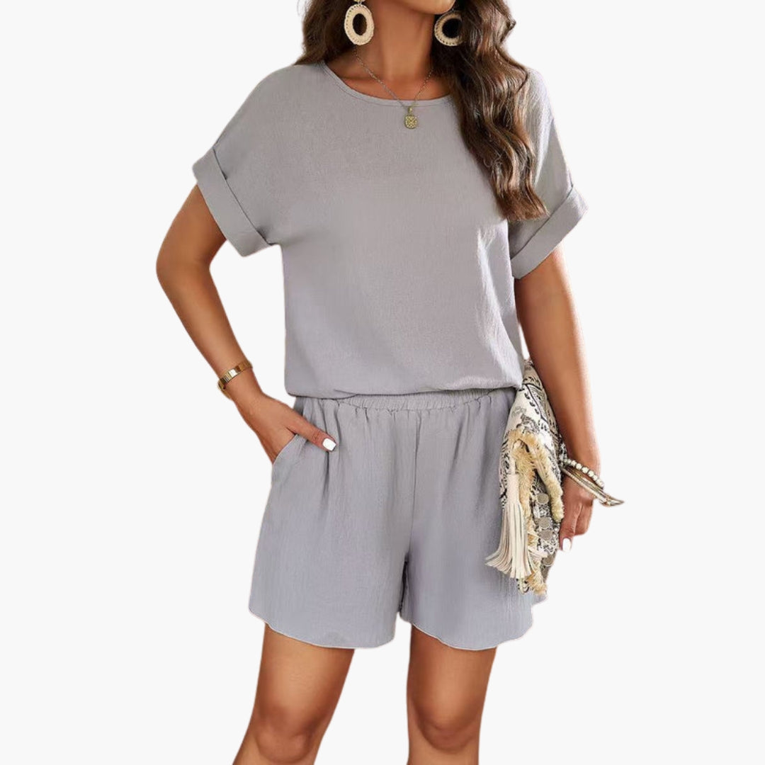 Tuta donna con maniche corte e tasche