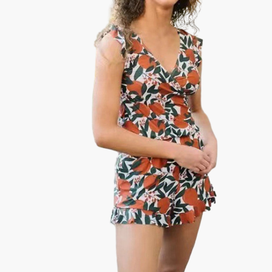 Tuta corta donna con volant, scollo a V e tasche