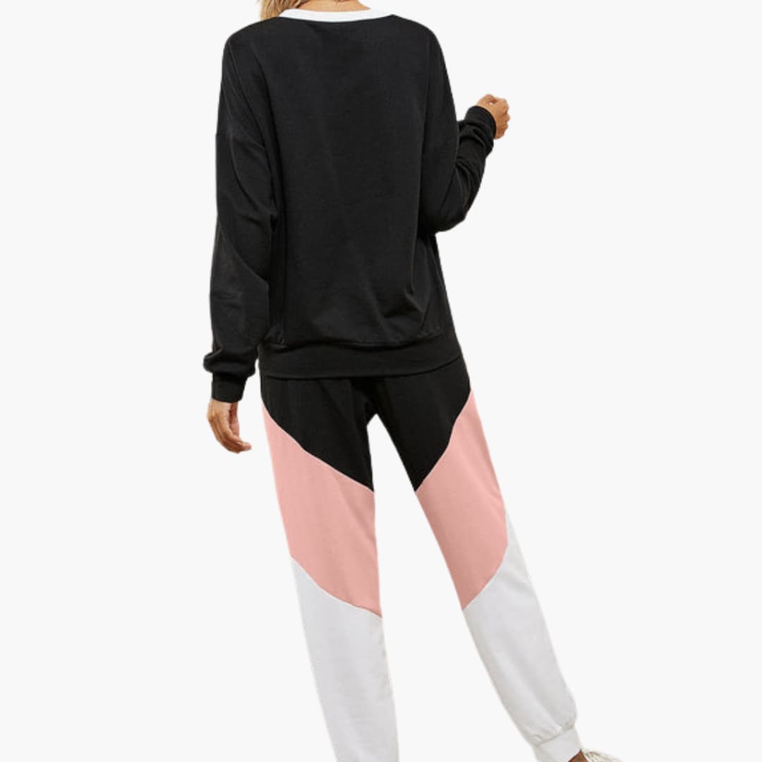 Completo sportivo donna con top a pannelli a contrasto e pantaloni con vita elastica