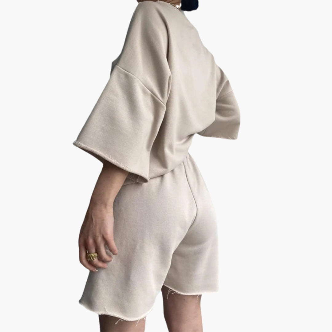 Completo sportivo donna con top corto e pantaloncini con coulisse