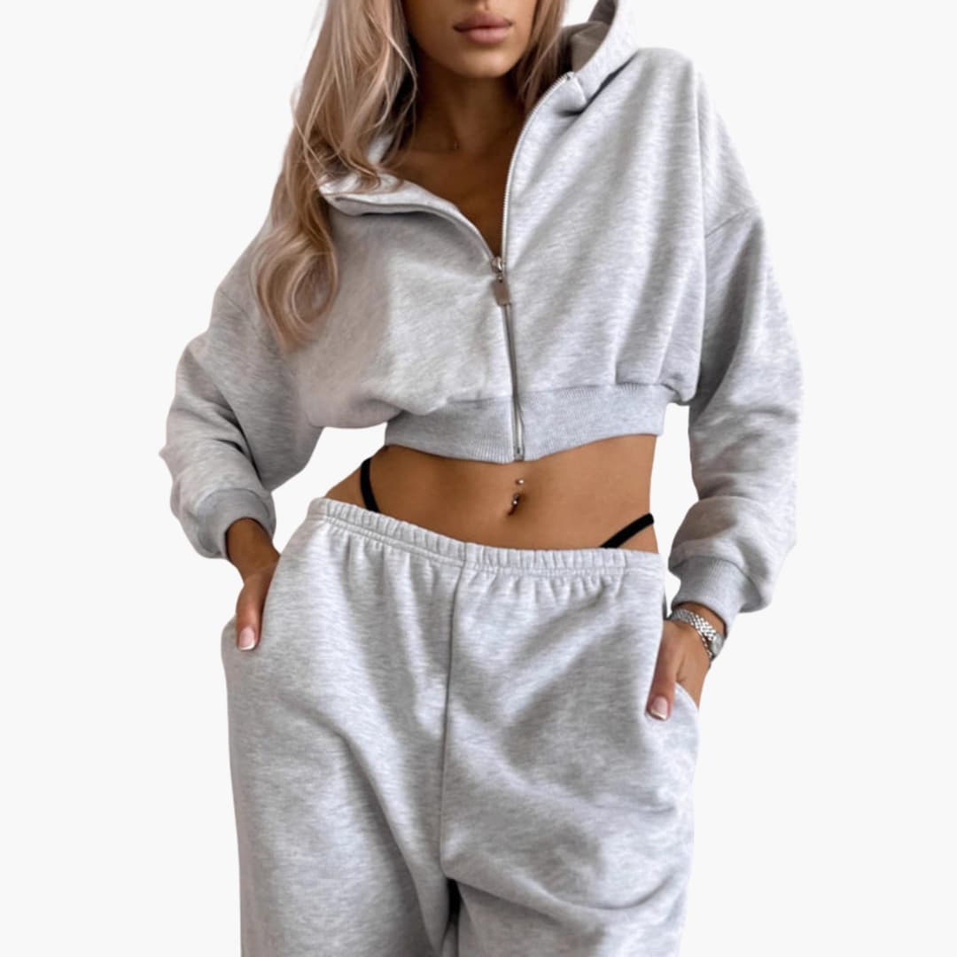 Completo sportivo donna con felpa corta con cappuccio e pantaloni a vita elastica
