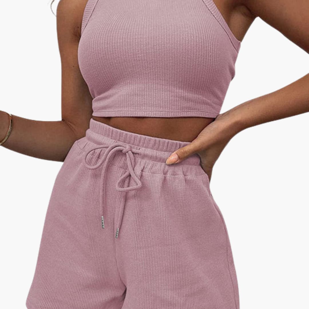 Completo sportivo donna con top a schiena scoperta e pantaloncini