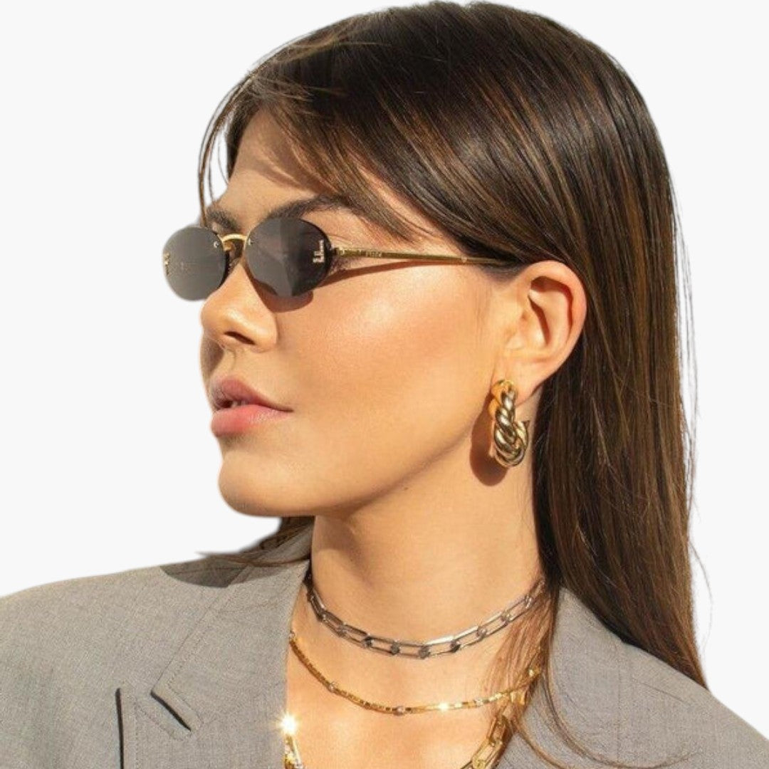 Lunettes de Soleil Femme avec Verres Ovales et Monture Sans Contour