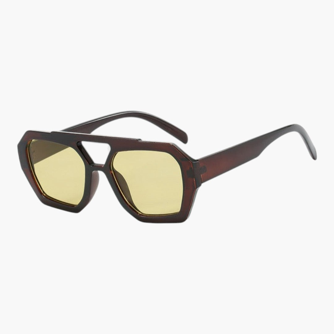 Lunettes de soleil femmes avec monture géométrique et verres teintés