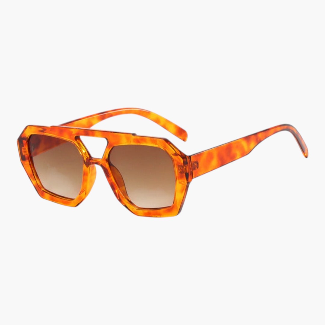 Lunettes de soleil femmes avec monture géométrique et verres teintés