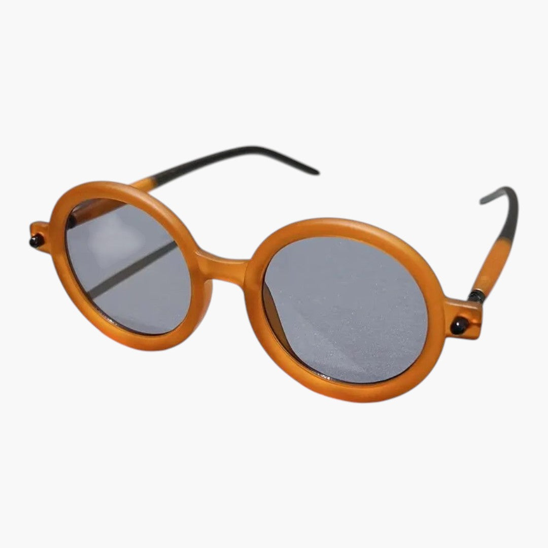 Women's sunglasses with round frame and wide temples