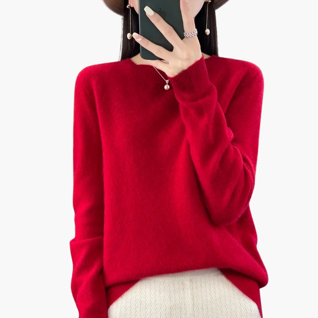 Dame striktrøje med rund hals og ribstrikkede manchetter