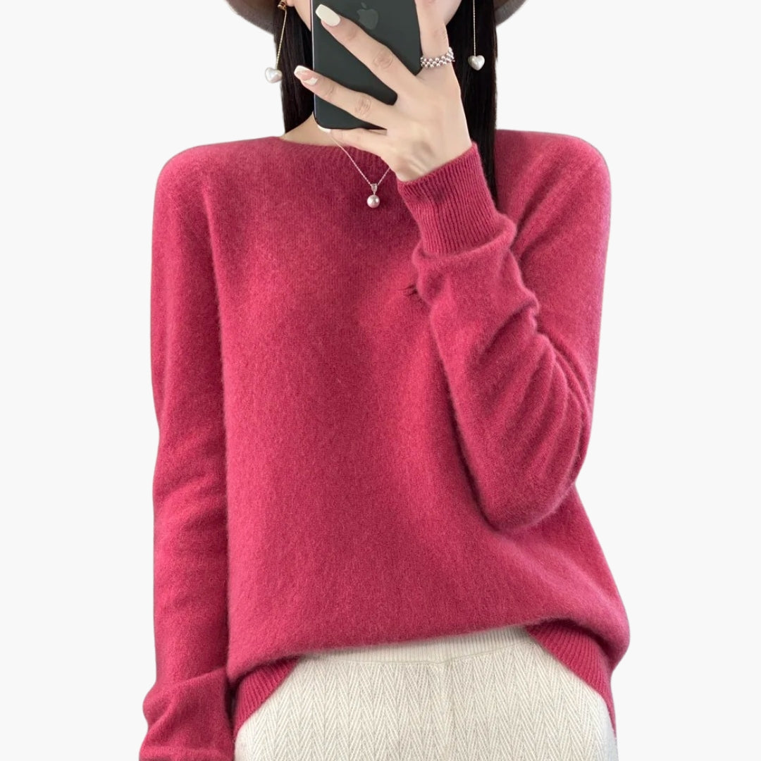 Dame striktrøje med rund hals og ribstrikkede manchetter