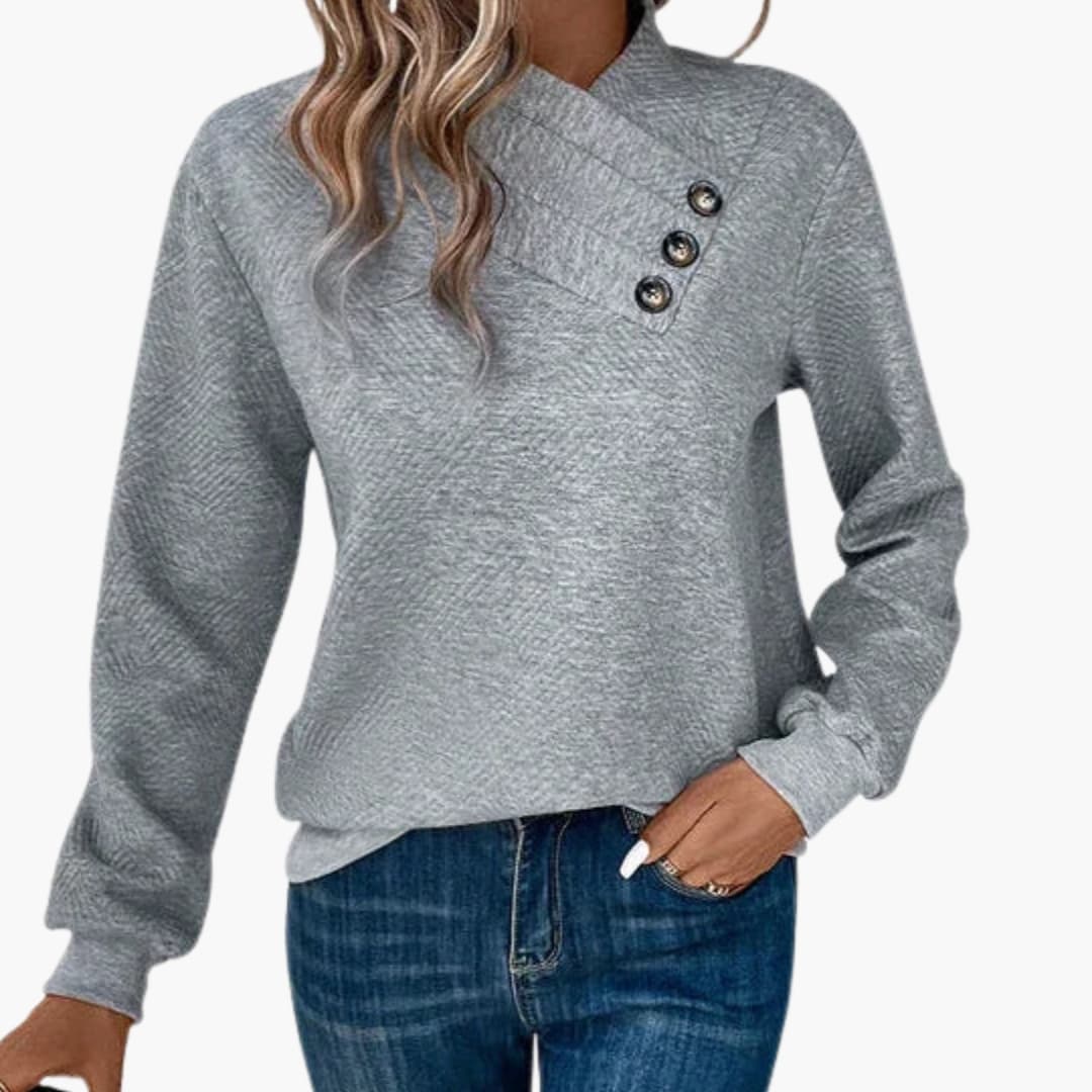 Suéter de mujer con cuello asimétrico y botón decorativo