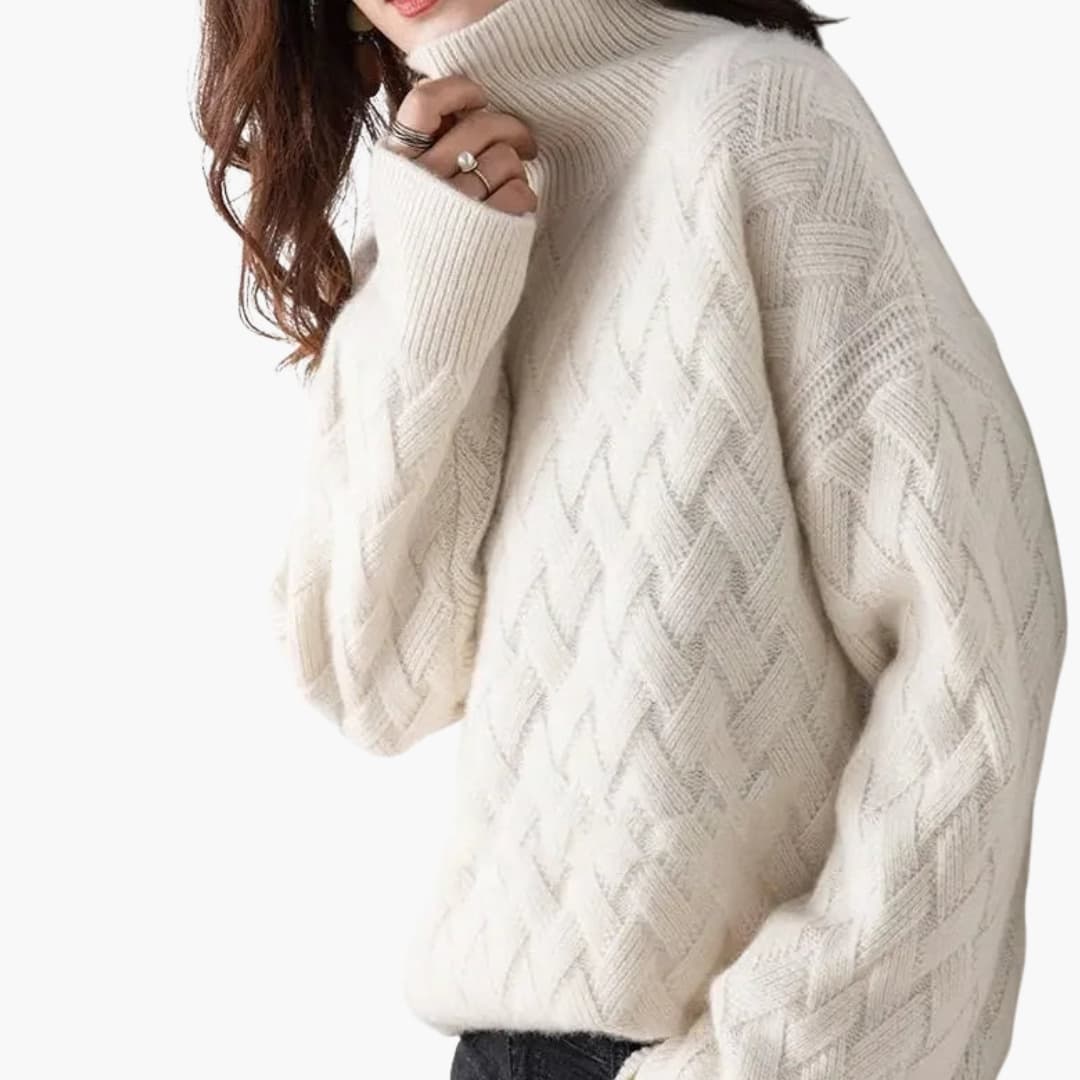 Suéter de mujer con cuello alto y superficie texturizada