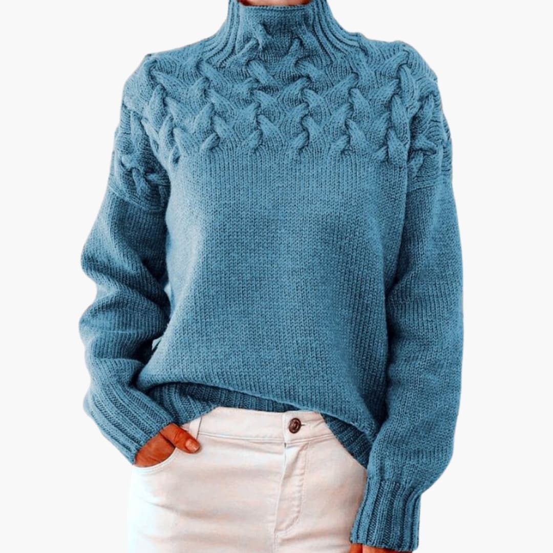 Jersey de mujer con cuello alto y trenzas tejidas