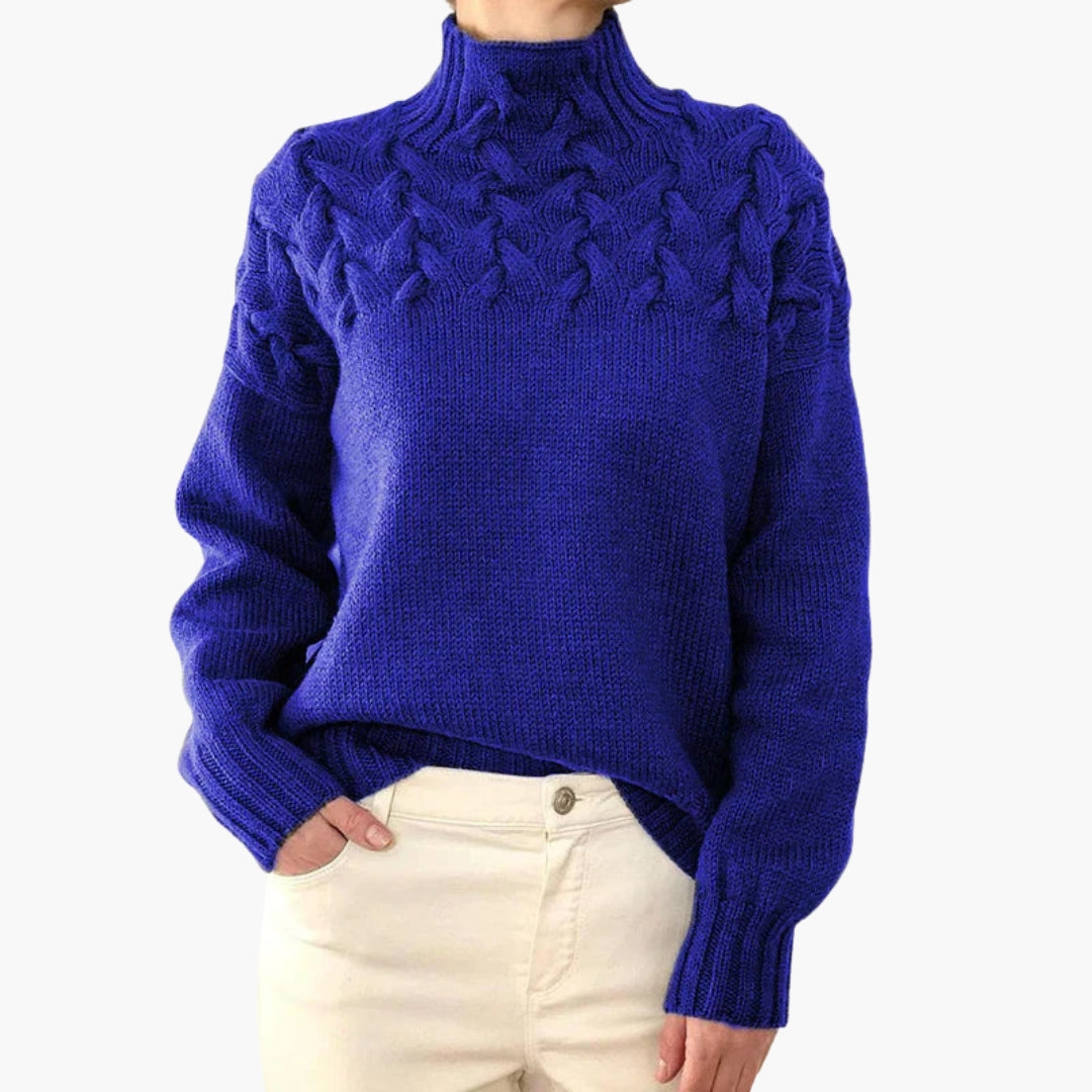 Pull femme à col montant et maille torsadée