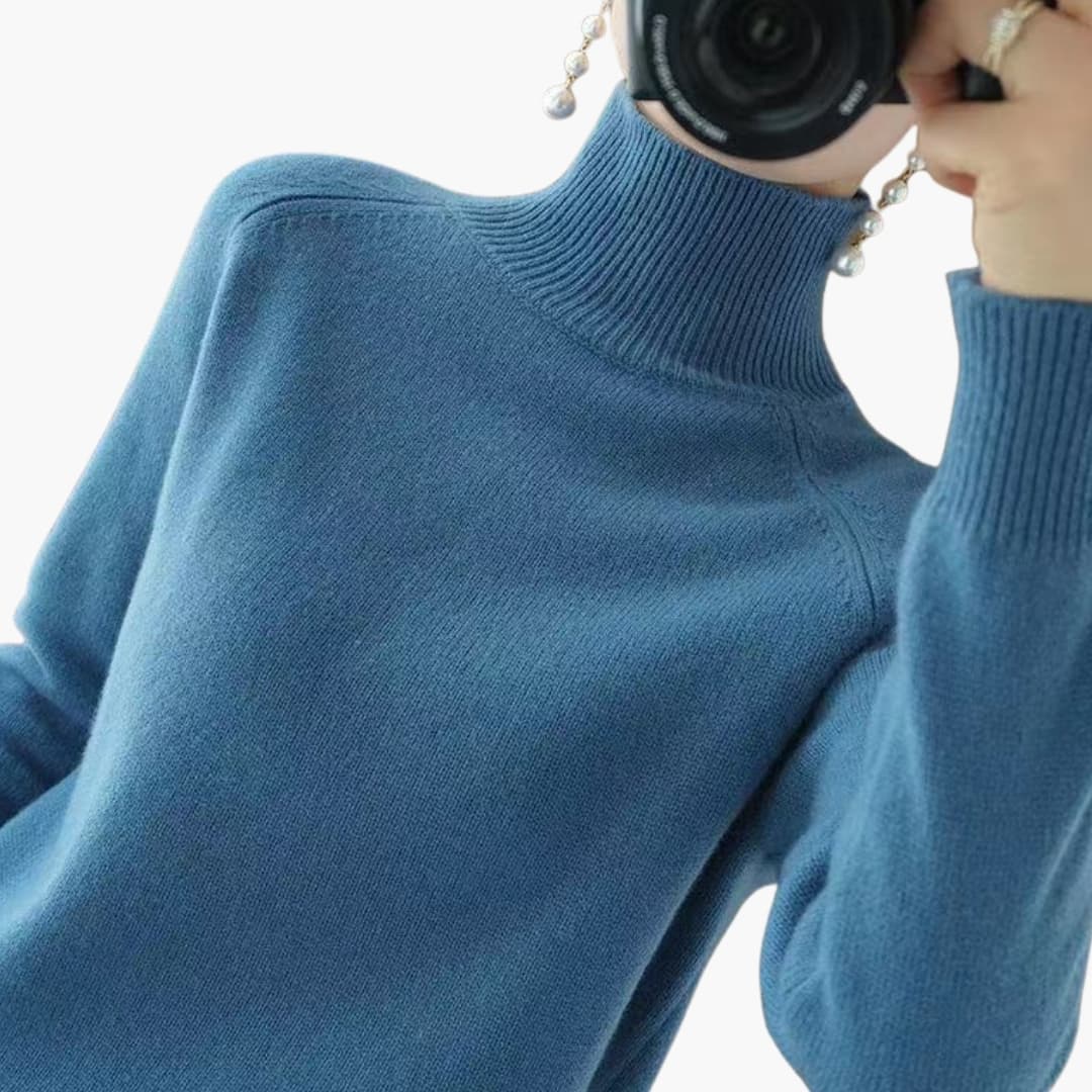 Pull femme à col roulé avec manches longues et ourlet côtelé