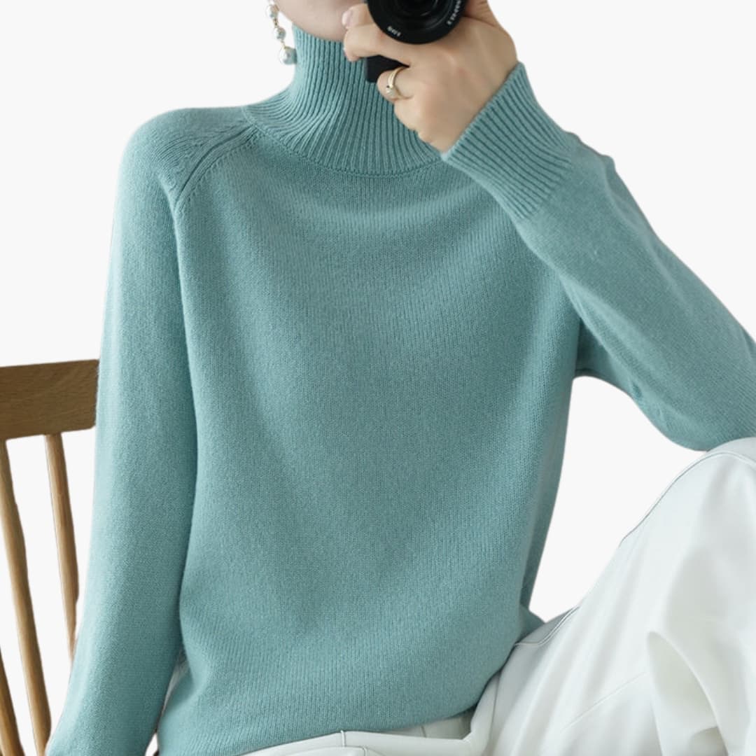 Pull femme à col roulé avec manches longues et ourlet côtelé