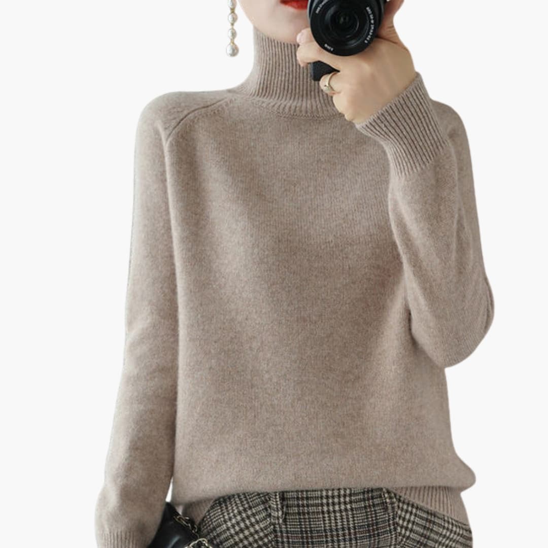 Pull femme à col roulé avec manches longues et ourlet côtelé