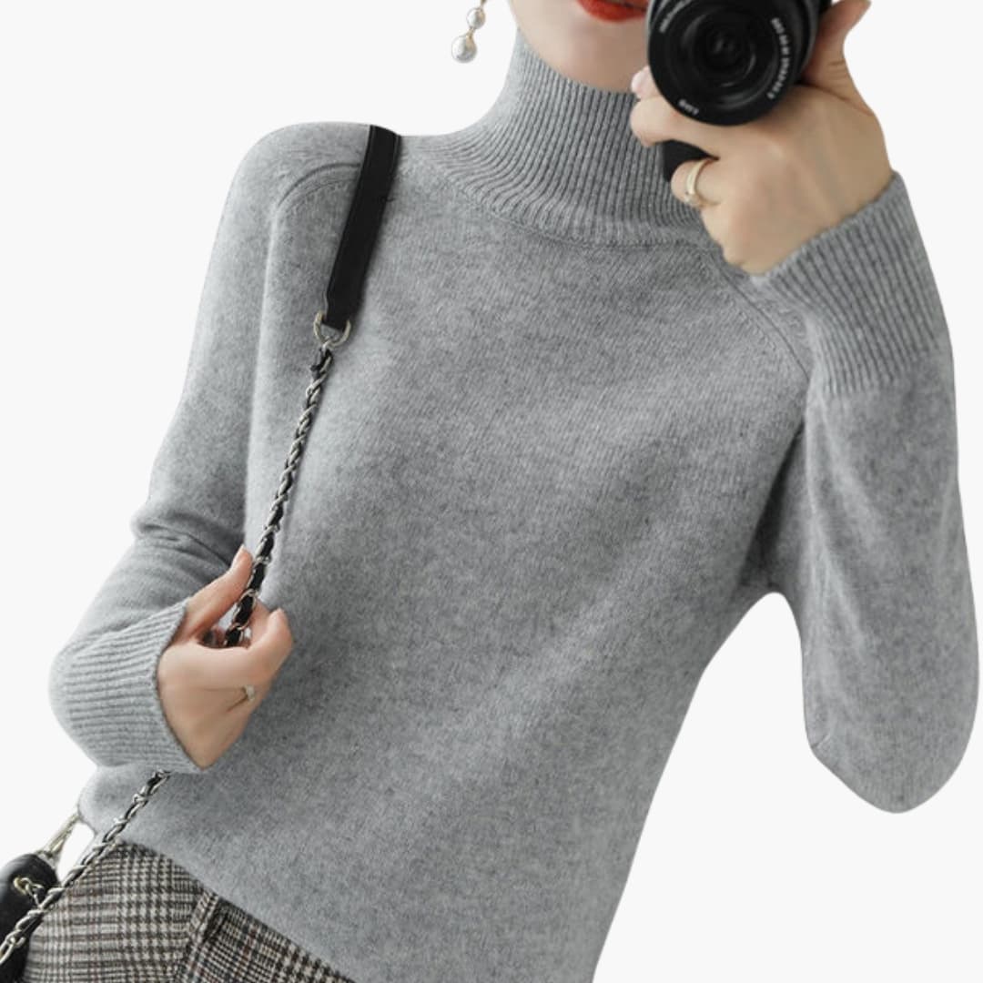 Pull femme à col roulé avec manches longues et ourlet côtelé