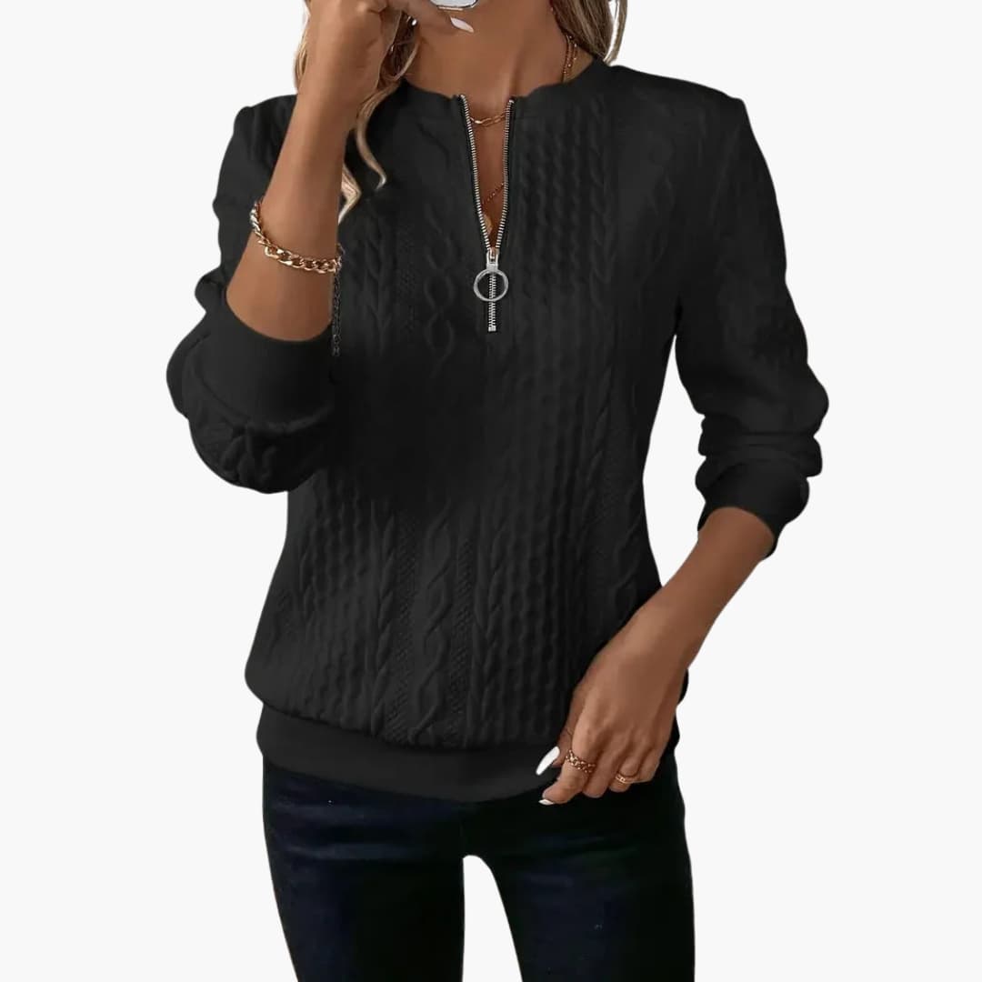 Pull femme à col zippé et maille torsadée