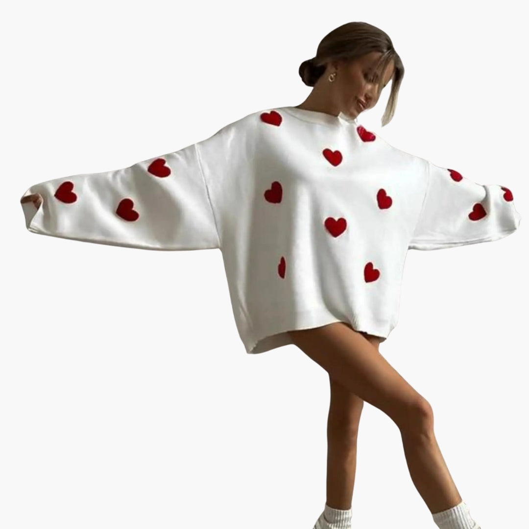 Damegenser med rund hals og hjerte-mønster