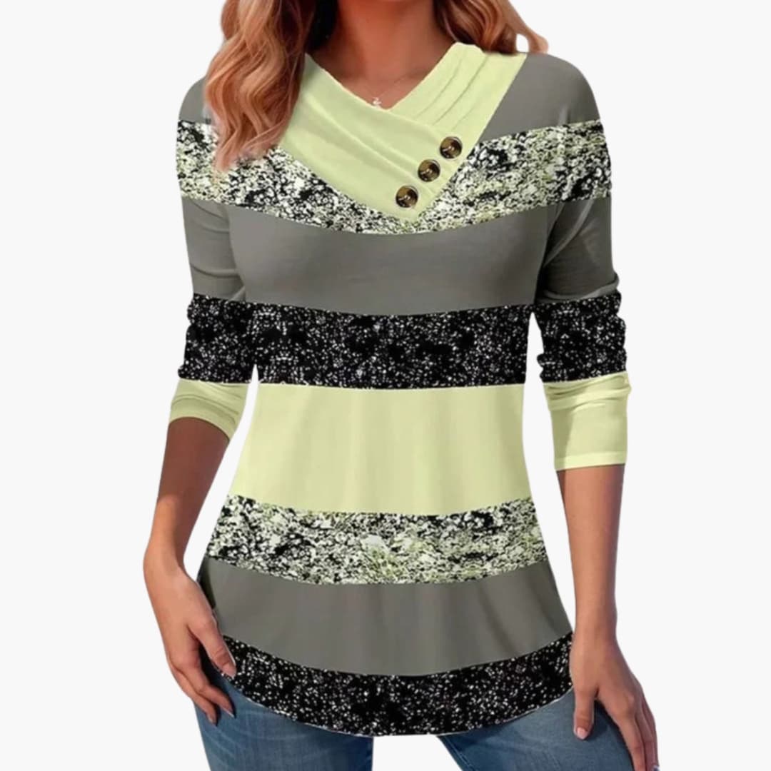 Damegenser med V-hals i finstrikket stoff med elegant fall