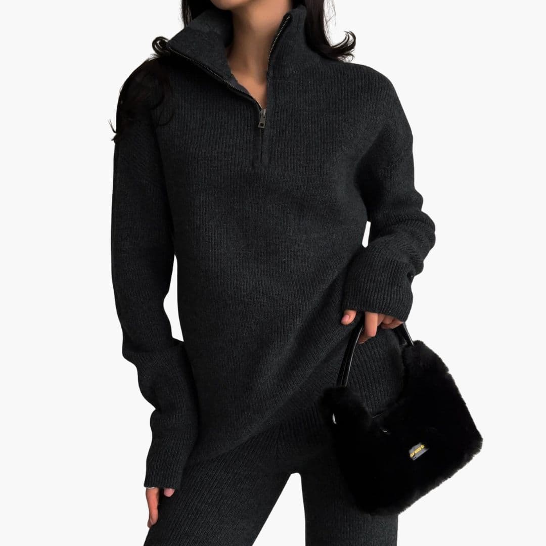 Suéter de mujer acanalado con cuello alto y cremallera corta