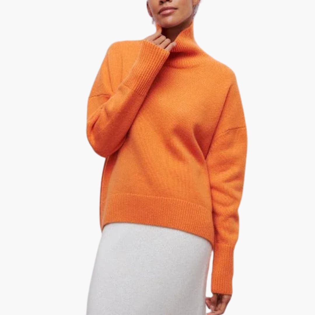 Pull femme oversize à col roulé et bords côtelés