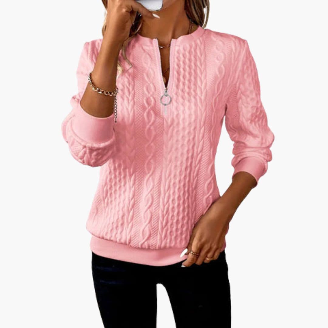 Pull femme torsadé avec col zippé et poignets côtelés