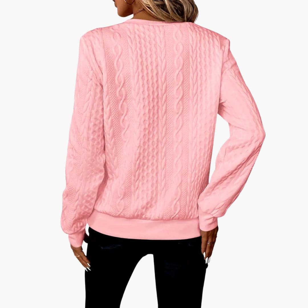 Pull femme torsadé avec col zippé et poignets côtelés