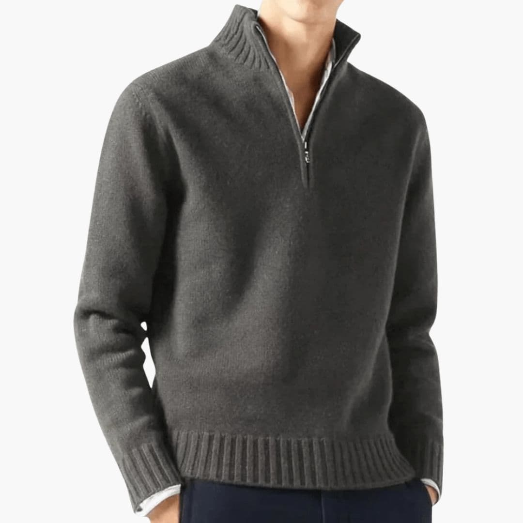 Pull homme à col zippé et base côtelée