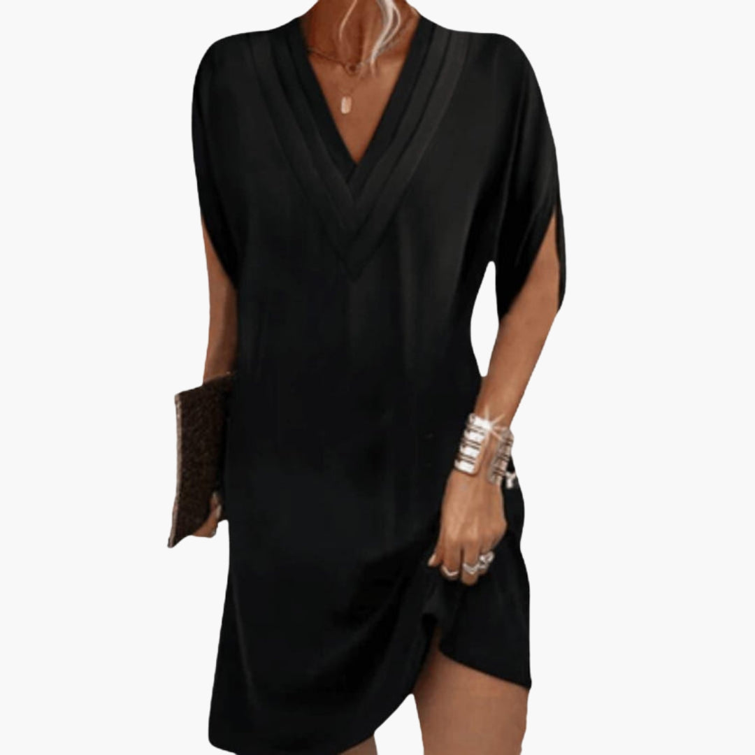 Short women's dress with V-neck and draped hem