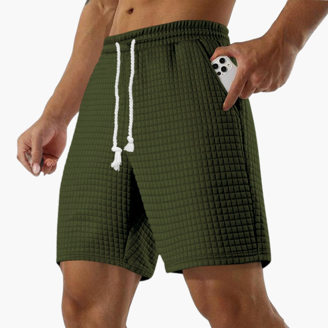 Kort sportshorts for menn med elastisk midje