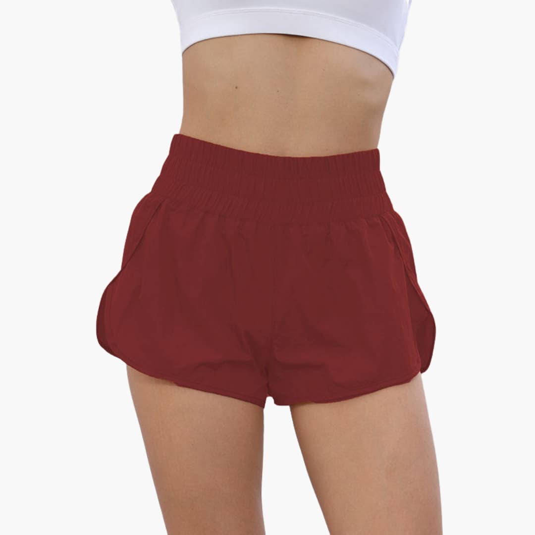 Short da corsa donna con vita elasticizzata e tasche laterali