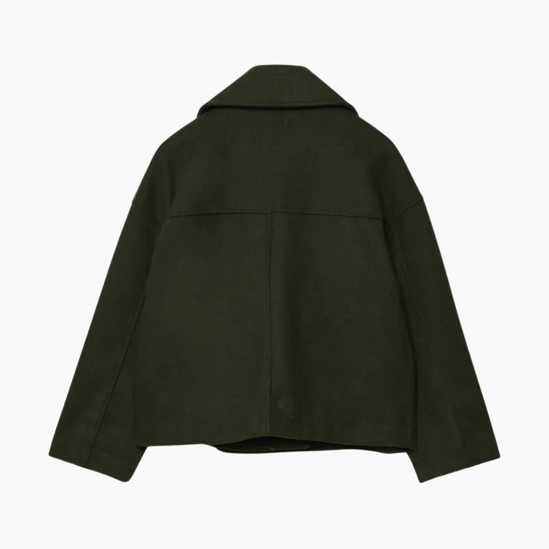 Kort damevest med krydset lukning