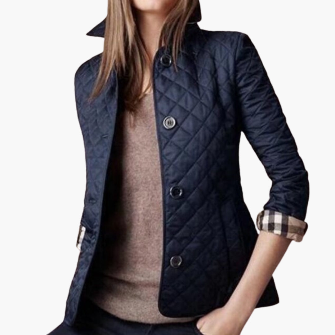 Vadderad damjacka med knappar och uppvikbara ärmslut