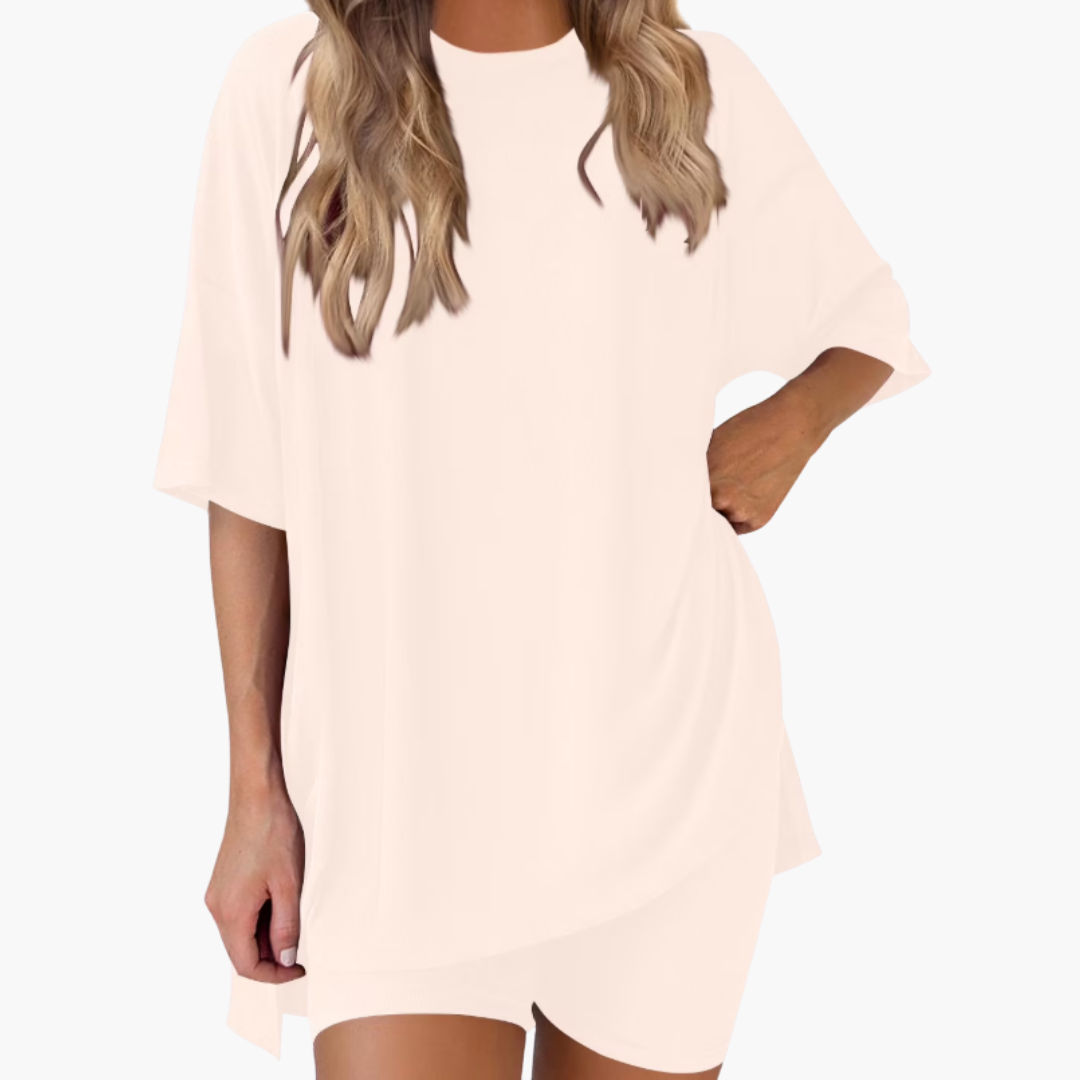 Completo sportivo donna con top a collo a V e pantaloncini larghi