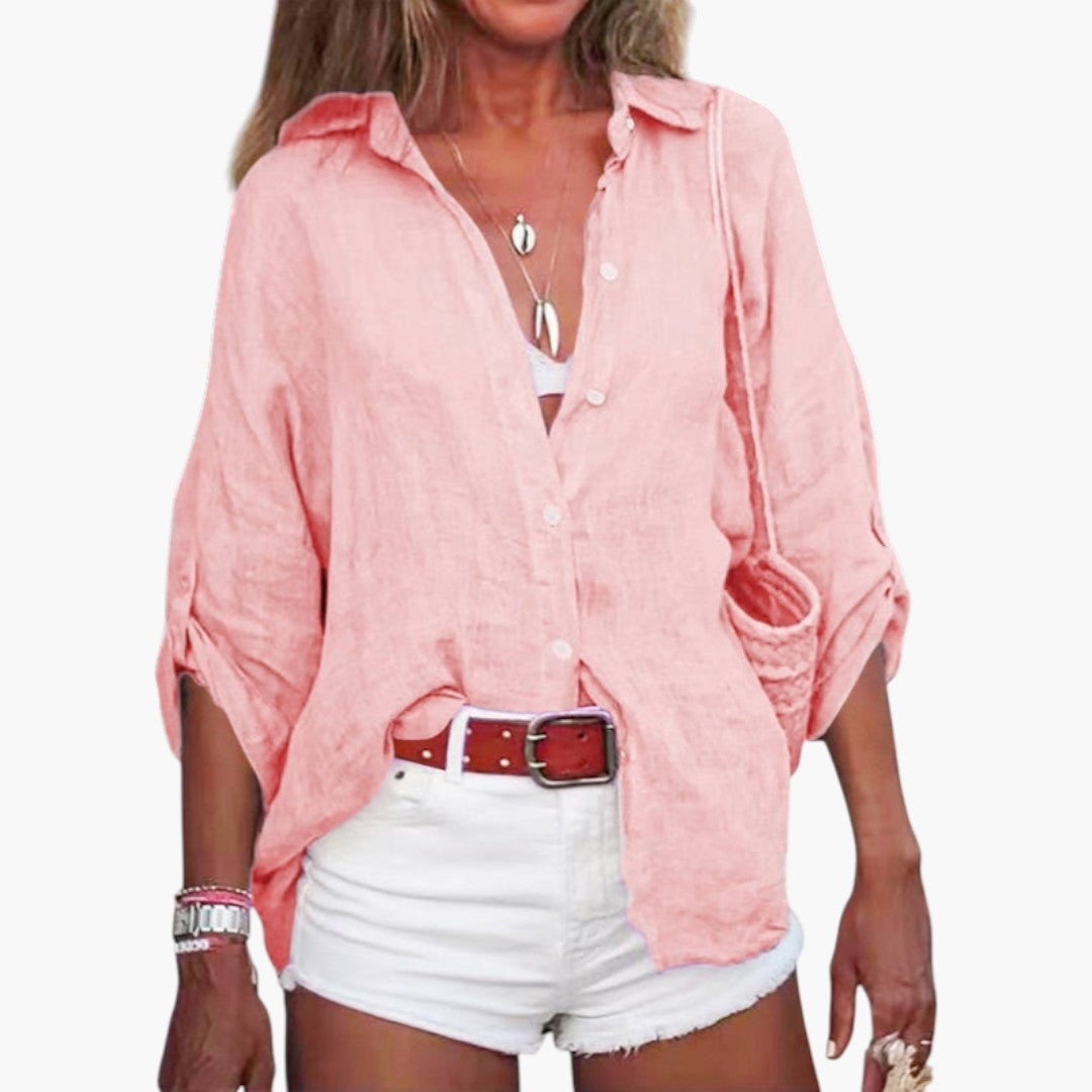Women's blouse with buttoned collar closure