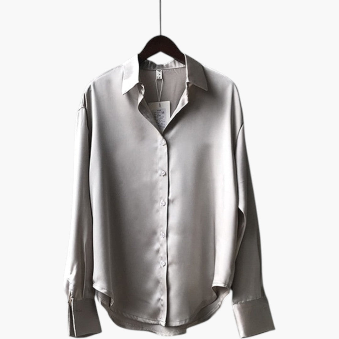 Women's blouse with collar and button closure