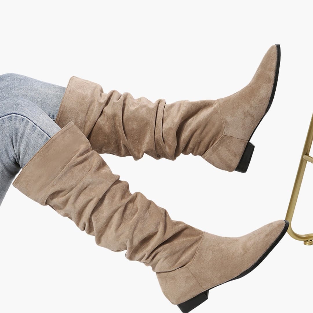 Bottes femme hauteur genou à bout pointu et semelle plate