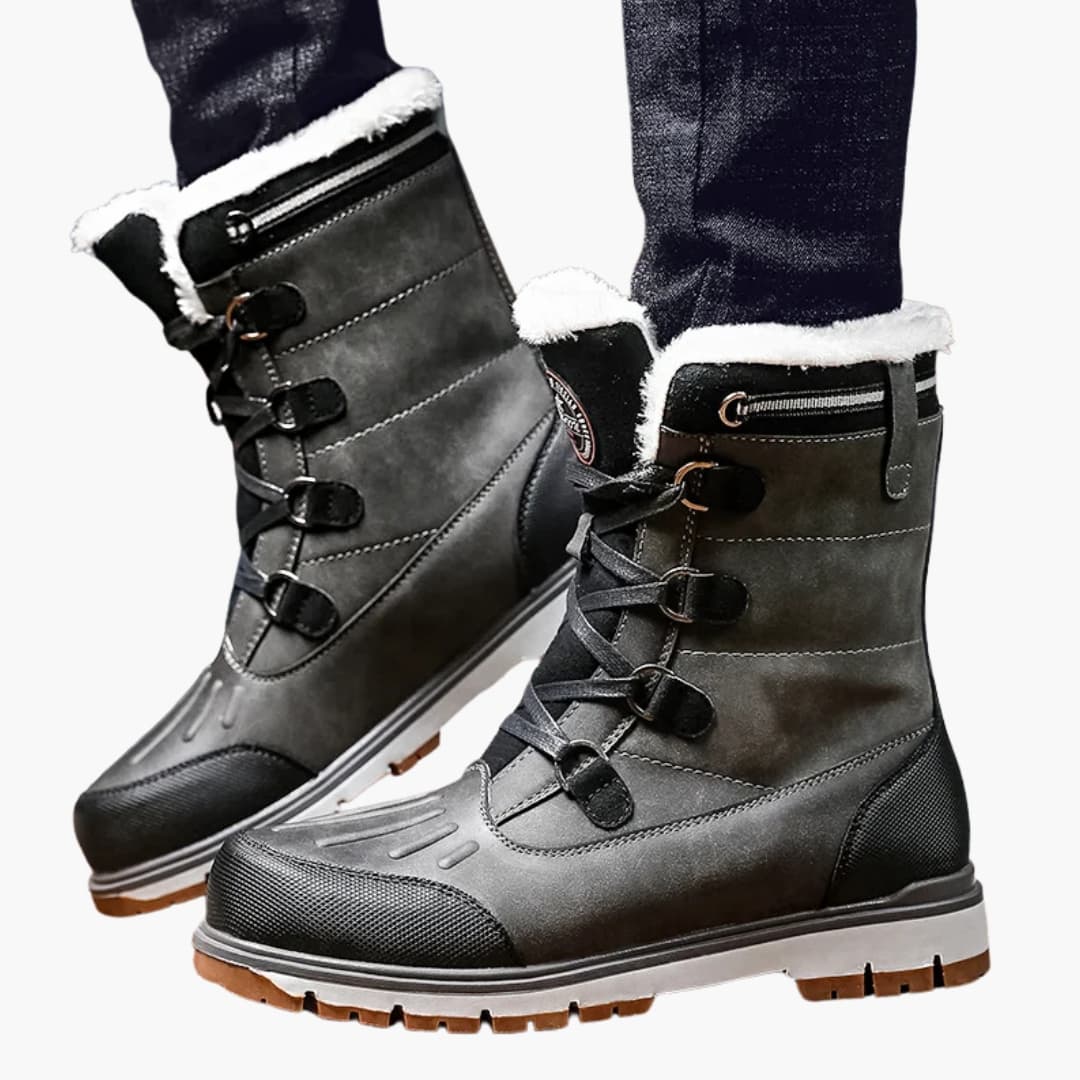 Bottes homme avec tige et semelle adaptées pour usage hivernal