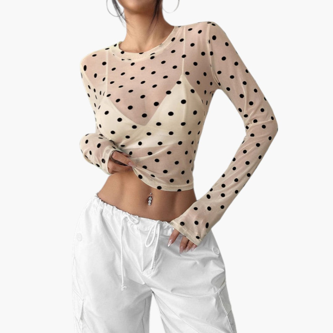 Women's blouse with round neckline and polka dot pattern