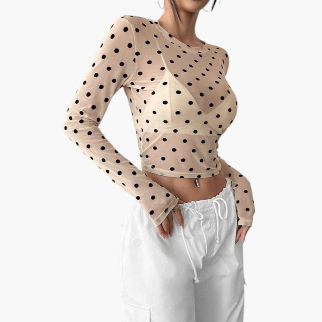 Women's blouse with round neckline and polka dot pattern