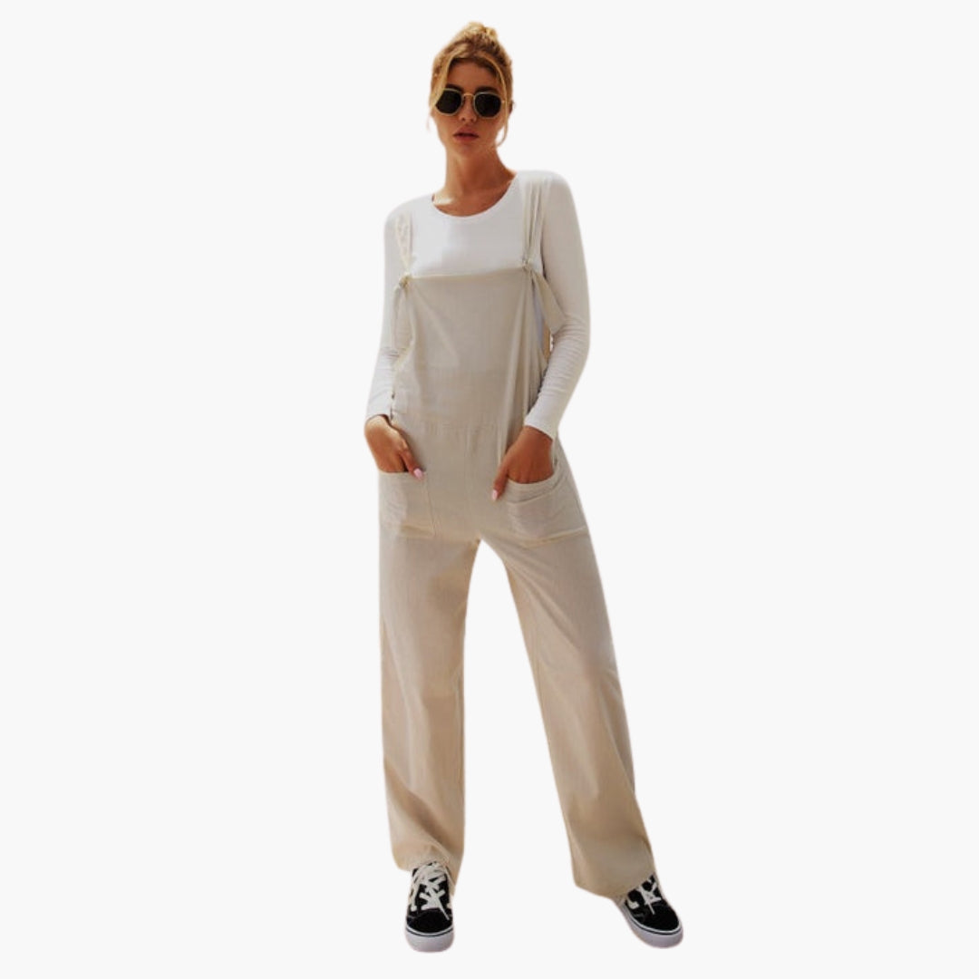 Tuta donna con spalline larghe e tasche anteriori